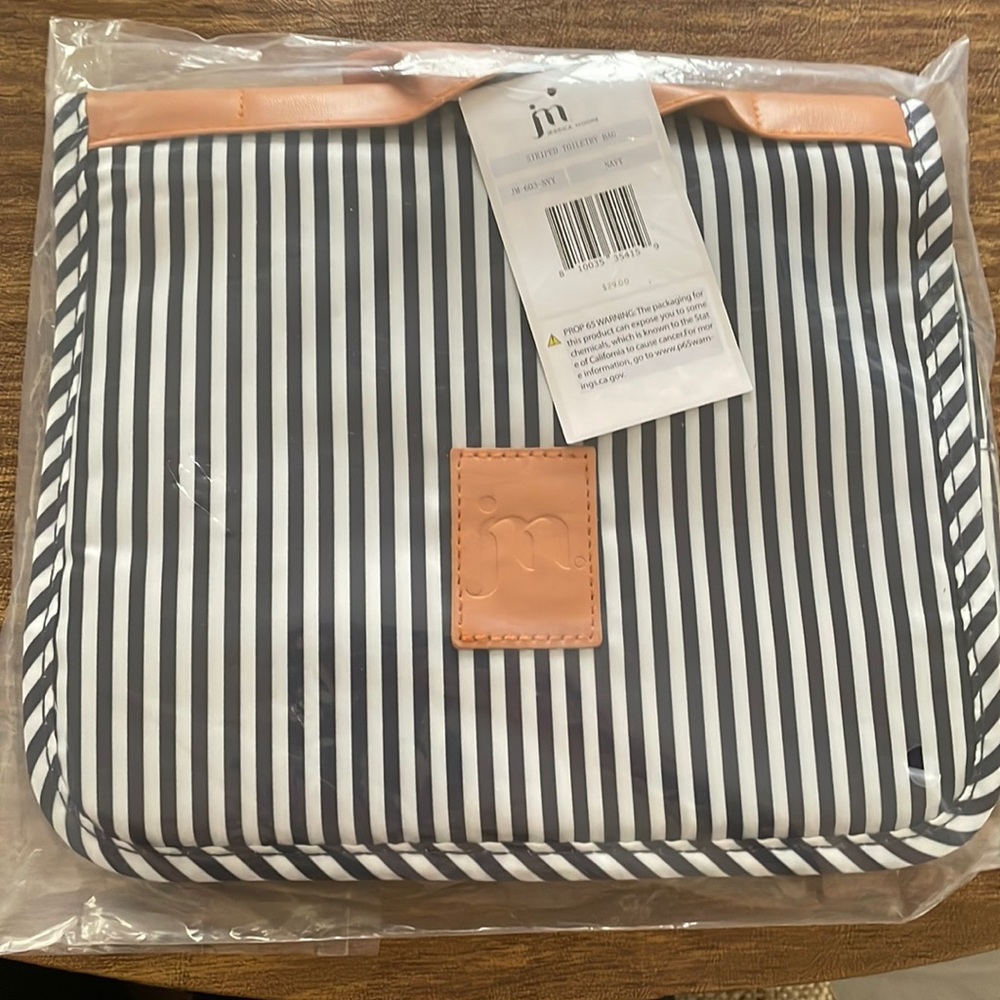 Jessica Moore striped toiletry bag